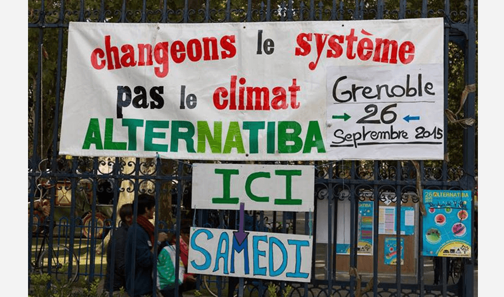 Affiche "Changeons le système pas le climat" pour le village Alternatiba à Grenoble